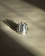 La tête ARC 10 en aluminium brossé.